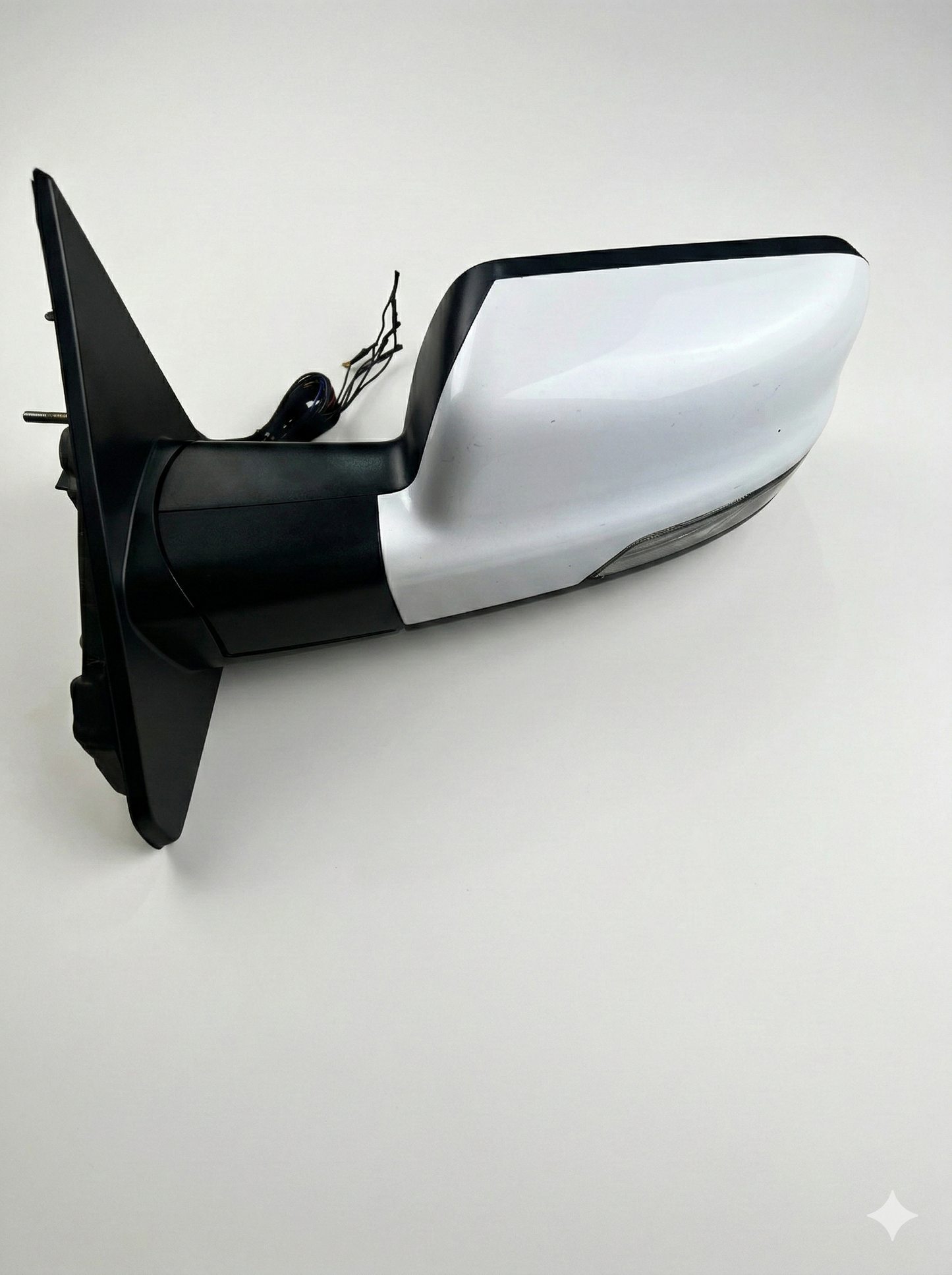 Passenger side wing mirror for a 2020 RAM 1500 DT Sport, featuring a white capped housing and integrated indicator lens