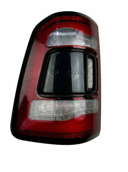 Left Hand LED Tail Light for RAM 1500 DT model with Premium Black Bezel, OEM part number 55112293AD.